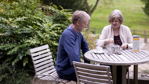 Visitors enjoying a cup of tea in the garden at Chartwell, Kent